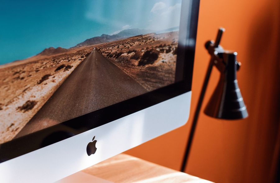 Close up photography of imac turned on — stock photo for Every photoaicompany design tool