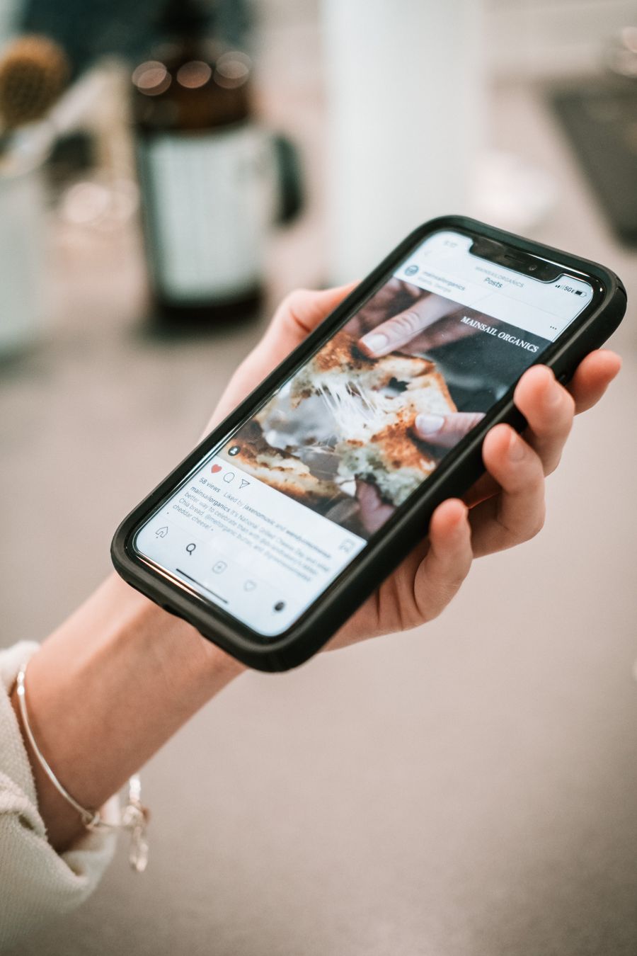 Close up view of hand holding smartphone — stock photo for Advertisements templates