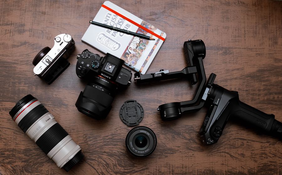 Camera with photographer equipment — Start from a template, finish in minutes phone mockup