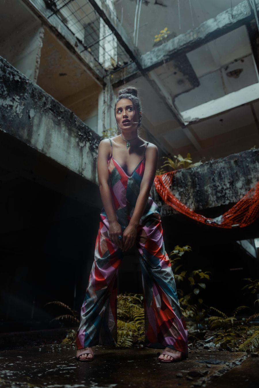 Woman posing in a jumpsuit in an abandoned building — Advertisements templates layers-panel mockup