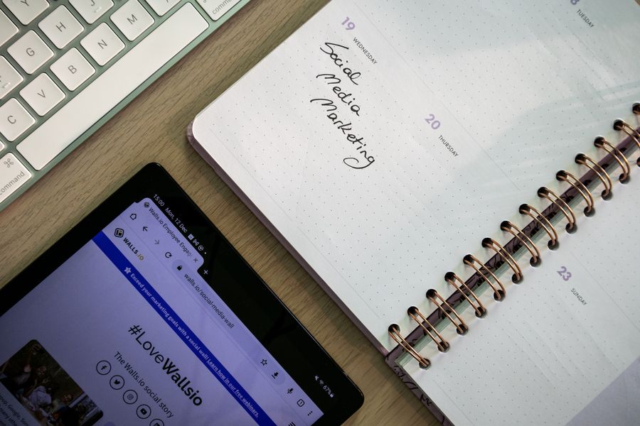 Notes and tablet on a desk — Create a Brand Kit motion card