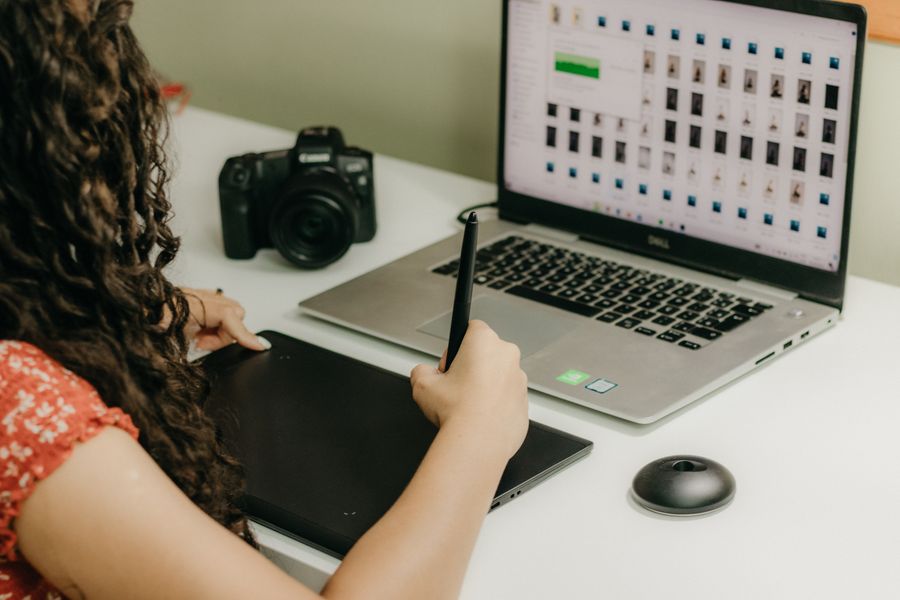 Photographer working on laptop — stock photo for Add Text
