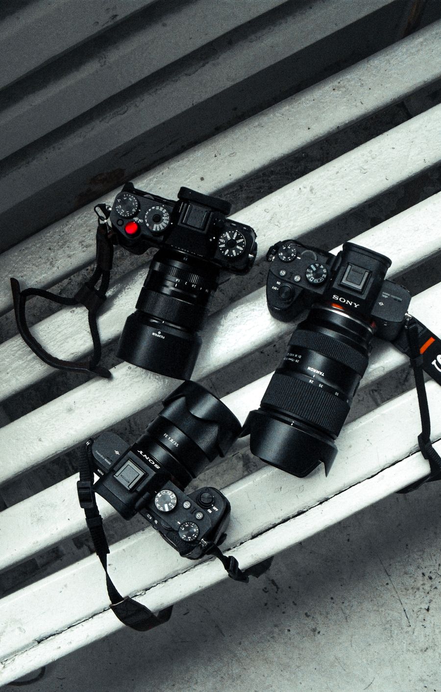 Sony cameras on white bench — stock photo for Everything in the editor, honestly described