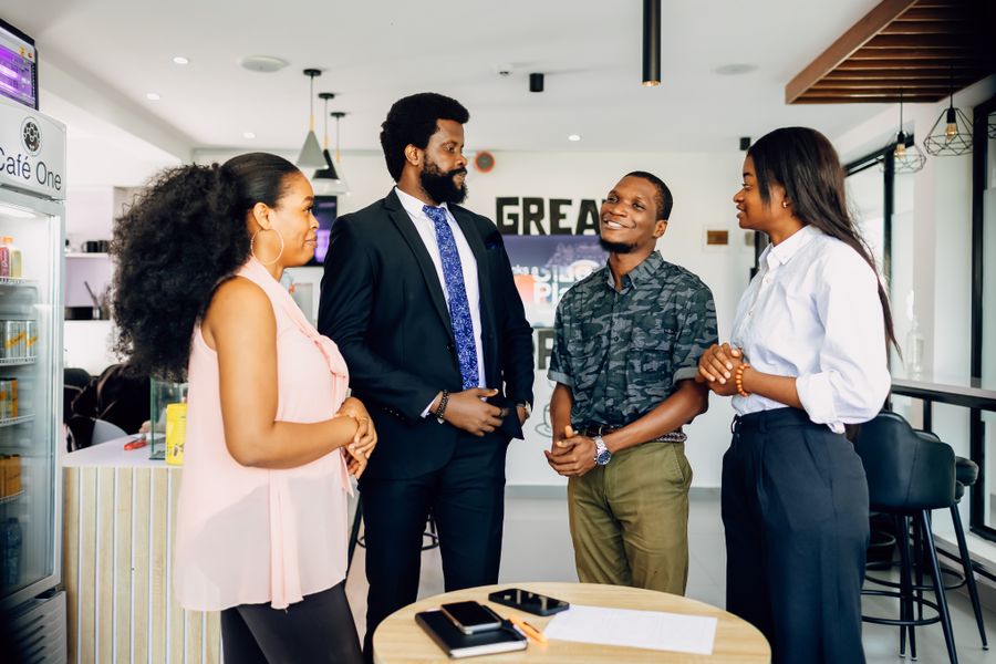 Casual office meeting in lagos nigeria — Every photoaicompany design tool editor mockup