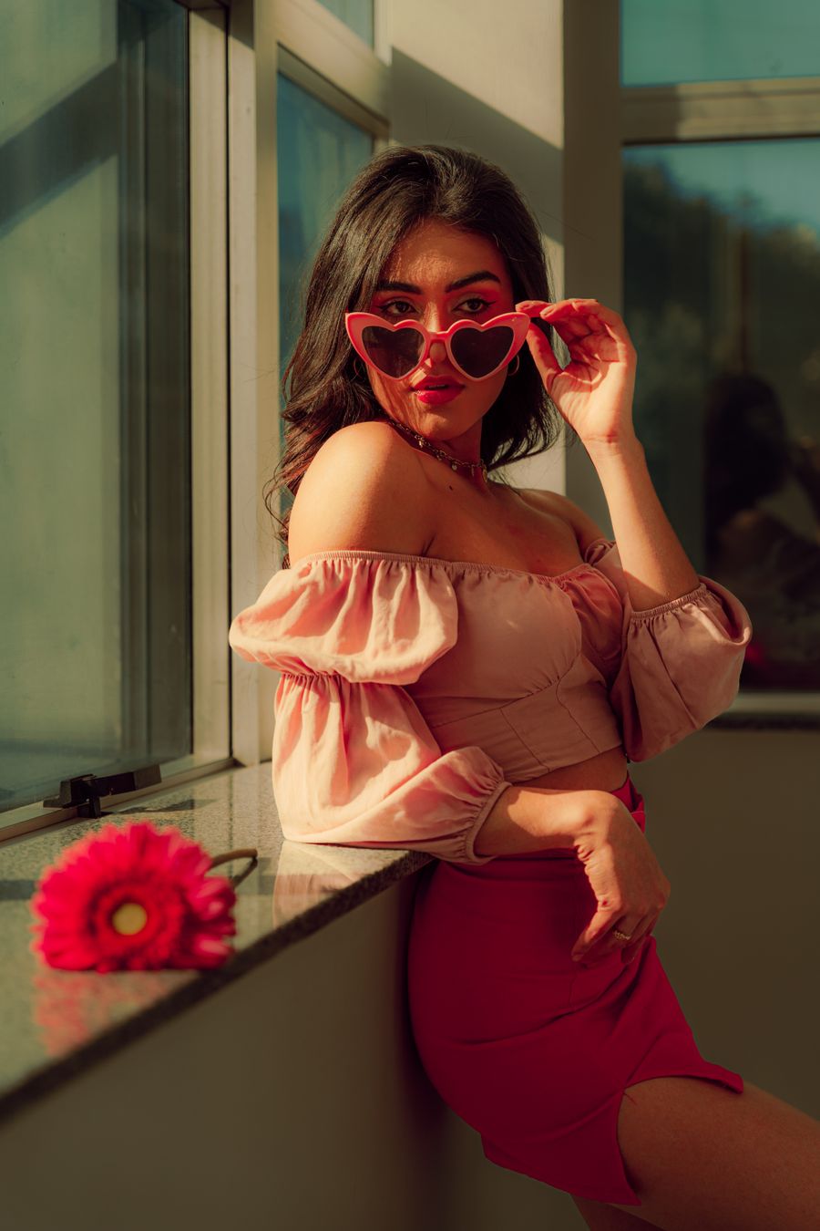 Stylish woman in pink heart glasses by window — Instagram Posts & Stories templates template-card mockup