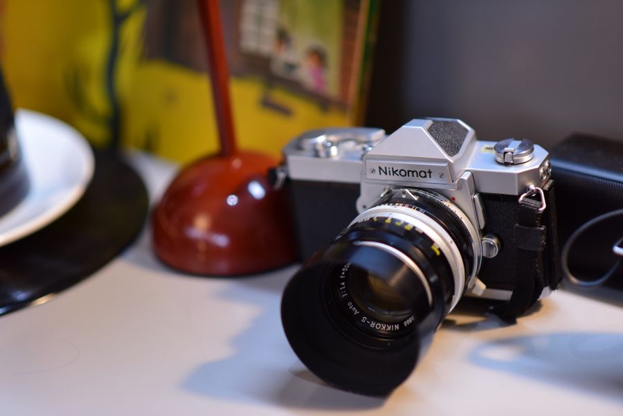 Vintage nikon camera on a retro desk — stock photo for Instagram Posts & Stories templates