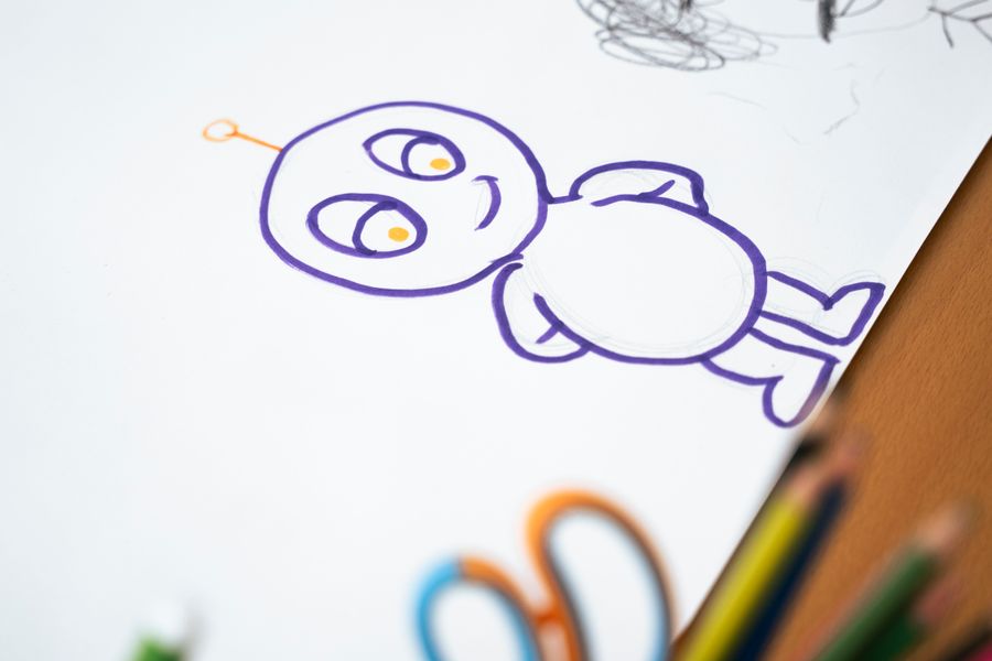 Creative cartoon character drawing on paper — Video templates dashboard mockup