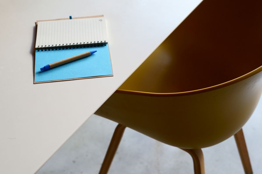 Minimalist workspace with notebook and chair — Simple pricing, no watermarks, no gotchas editor mockup