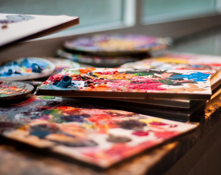 Vibrant paint palettes on artist s table — Add an Image annotated figure