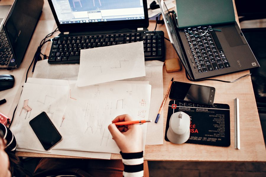 A woman sketching a furniture — Terms of Service dashboard mockup