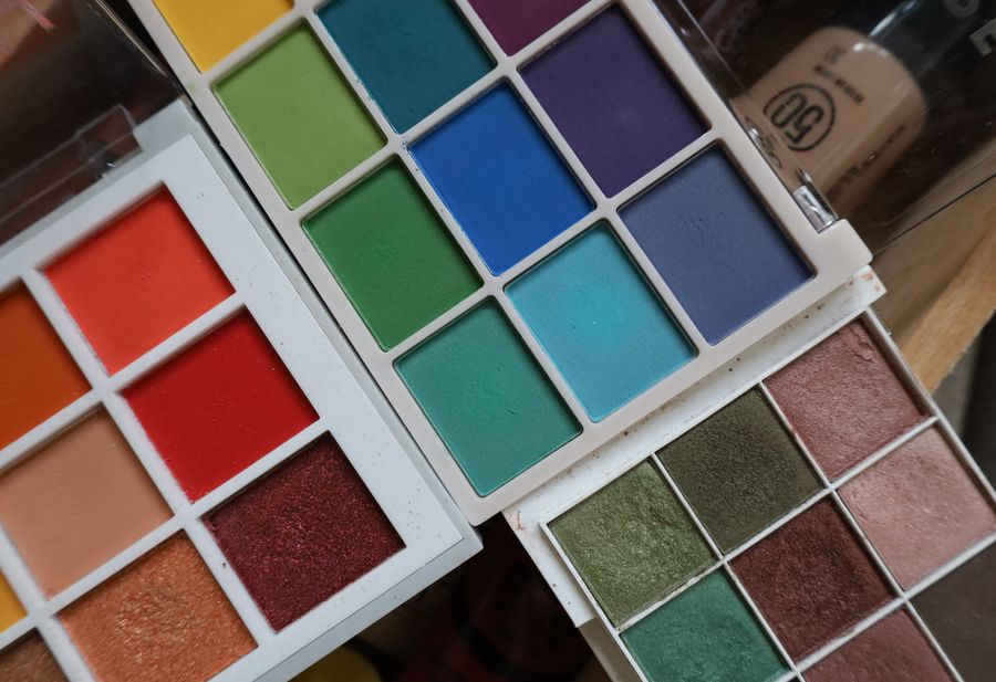 Colorful makeup palettes in close up view — stock photo for Start designing free