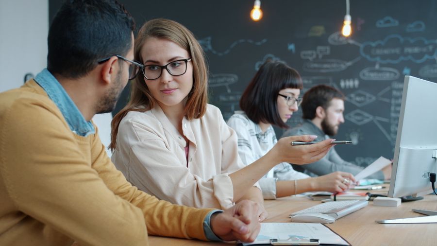 Young professionals collaborating in modern office — stock photo for Privacy Policy