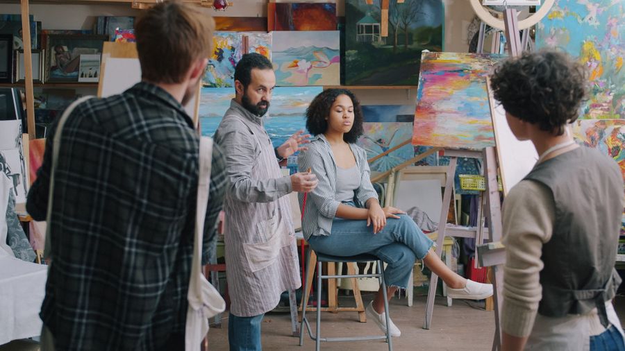 Art class with instructor and students in studio — Privacy Policy layers-panel mockup