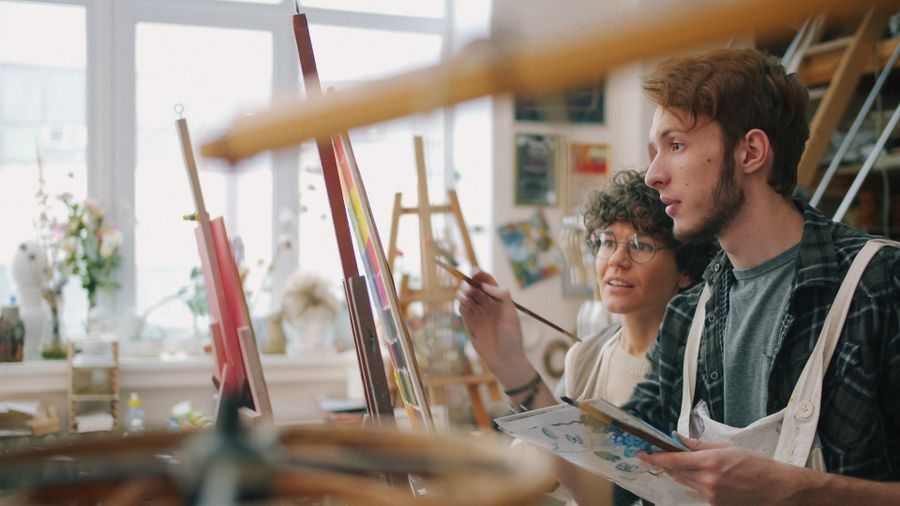 Art students engaging in creative painting activity — Suggest a Color Palette template-card mockup