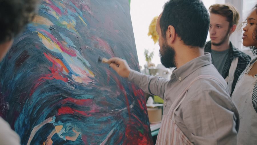 Art class with students observing abstract painting — stock photo for Every photoaicompany design tool