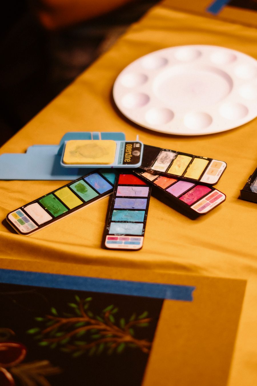 Colorful watercolor palette on artist table — stock photo for Every photoaicompany design tool