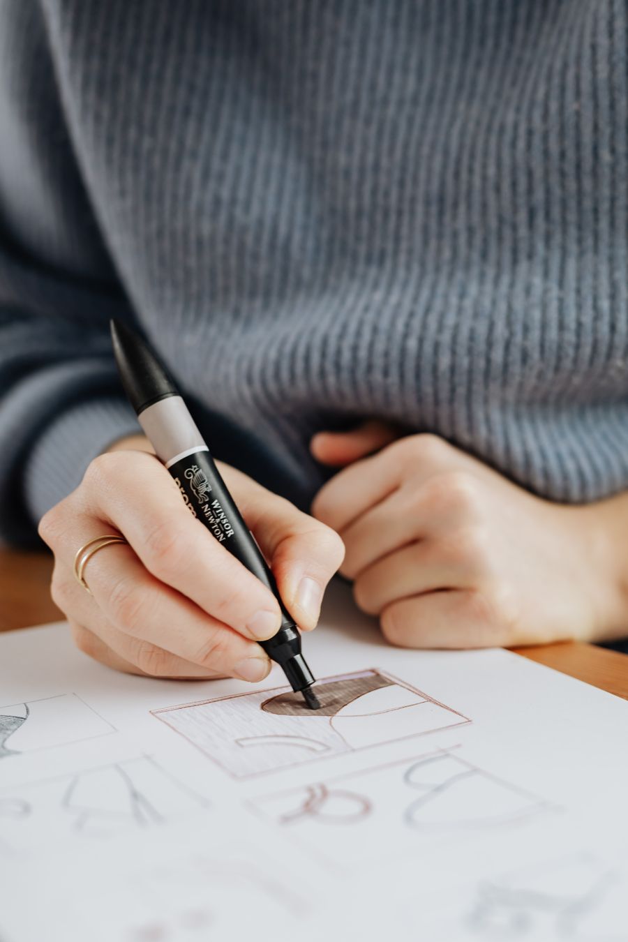 Crop female designer drawing on paper sheet — stock photo for Start a Design from a Template