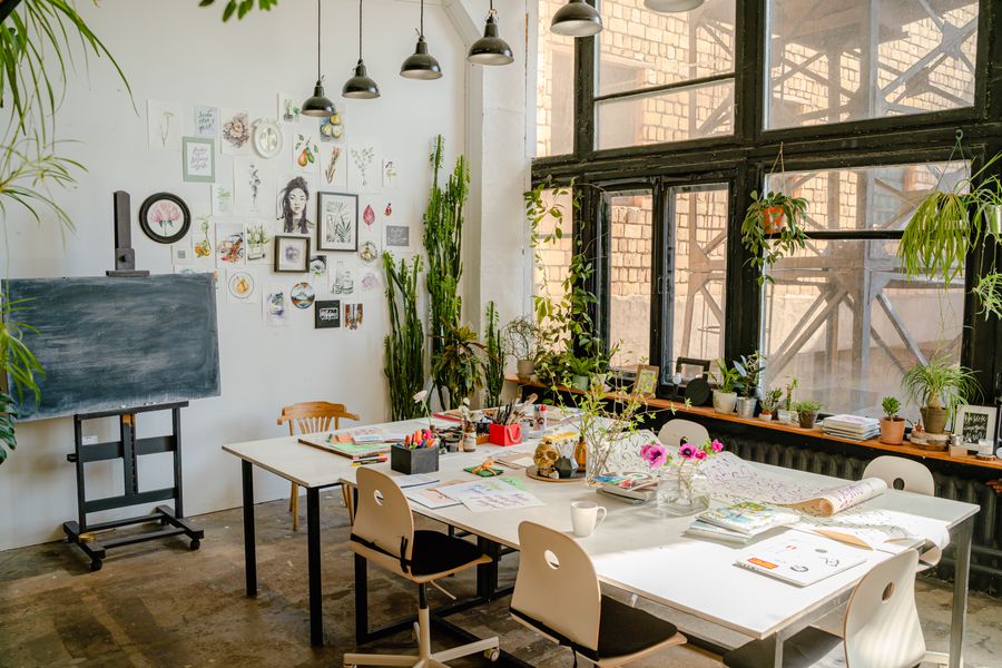 A table with art supplies in a creative studio — Everything in the editor, honestly described phone mockup