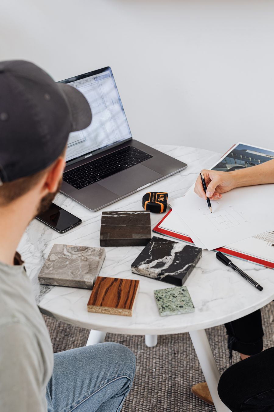 Man wearing a cap and tile samples on a round table — Simple pricing, no watermarks, no gotchas export-dialog mockup