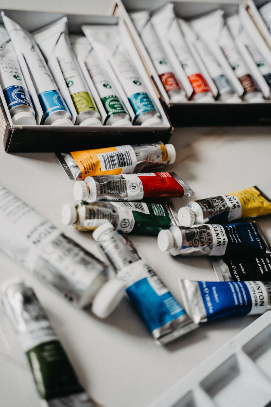 Assorted colors of paint tubes — PhotoAI Company — AI photo & design editor dashboard mockup