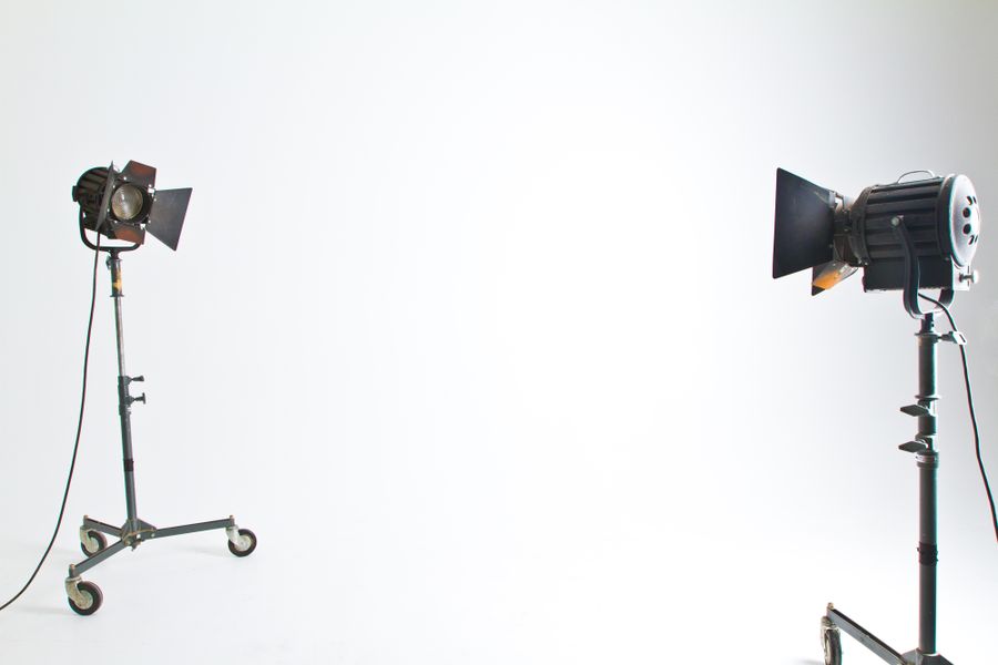 Two studio lights on an empty studio — Generate a Design resize-canvas mockup