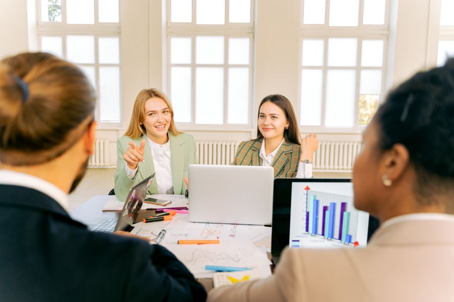 Colleagues having a meeting — stock photo for Everything in the editor, honestly described