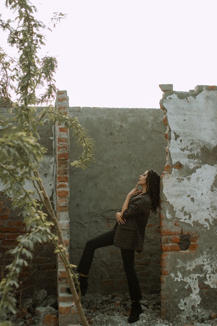 Female standing near weathered walls in broken destroyed building — Apply a Text Style export-dialog mockup
