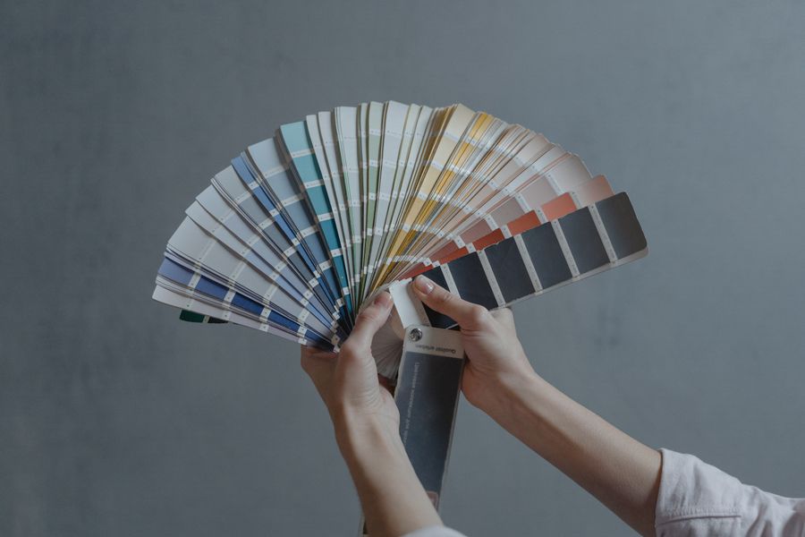A person holding colors samples — stock photo for Design craft, taught with the product