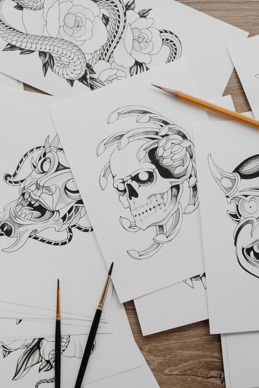 Tattoo designs stacked on one another — Design craft, taught with the product browser mockup