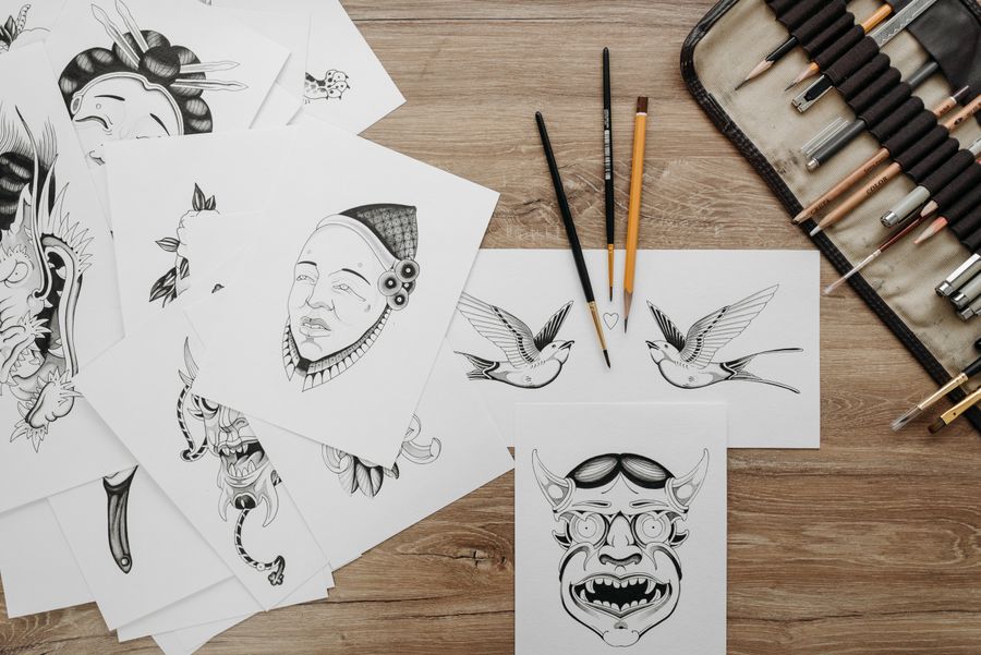 Drawings and pencils on table — Simple pricing, no watermarks, no gotchas layers-panel mockup