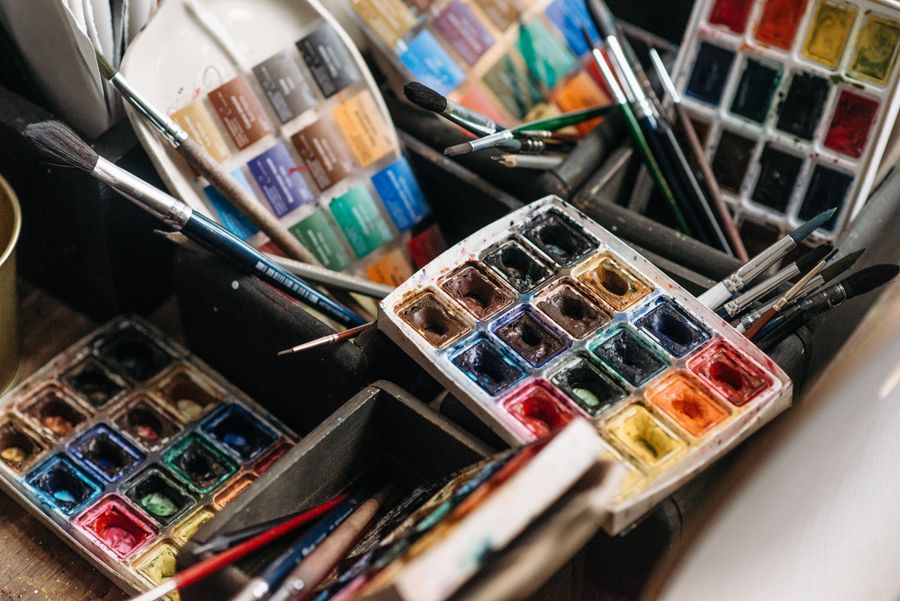 Colorful paints on craft workshop — Add Text annotated figure