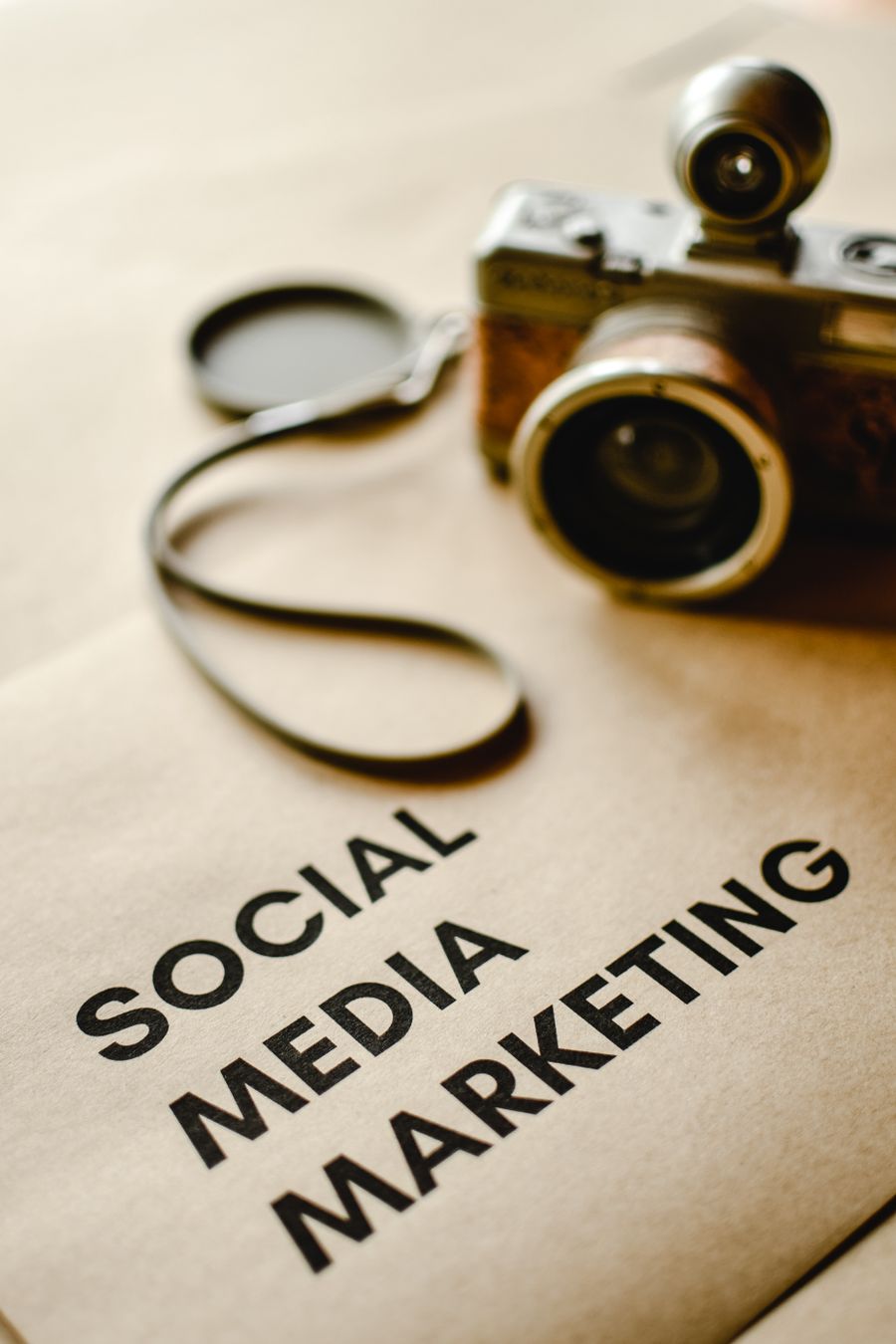 A vintage camera on brown paper — stock photo for Export a Design