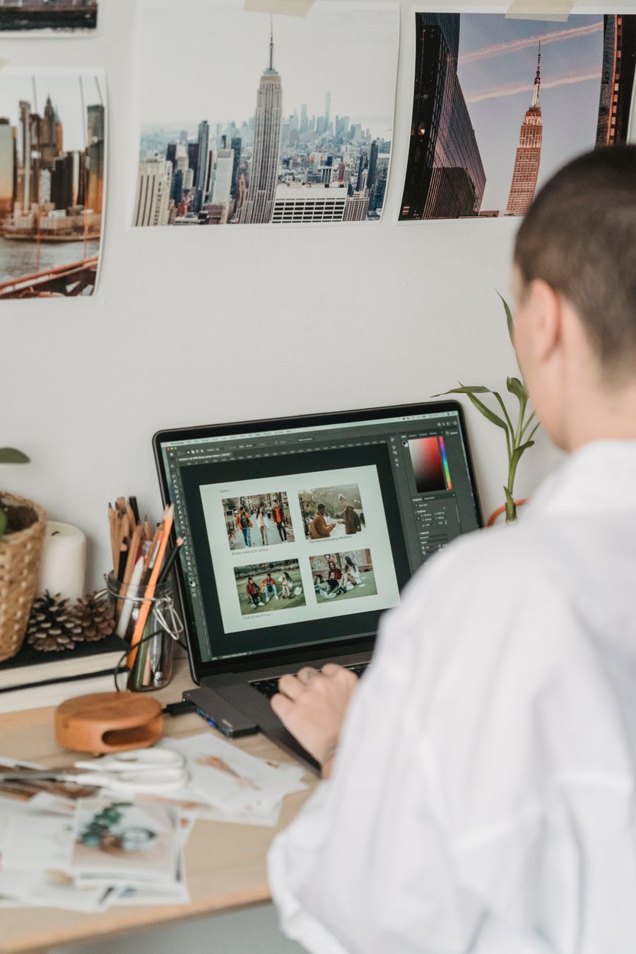 Busy woman editing photos on laptop — Generate a Design layers-panel mockup