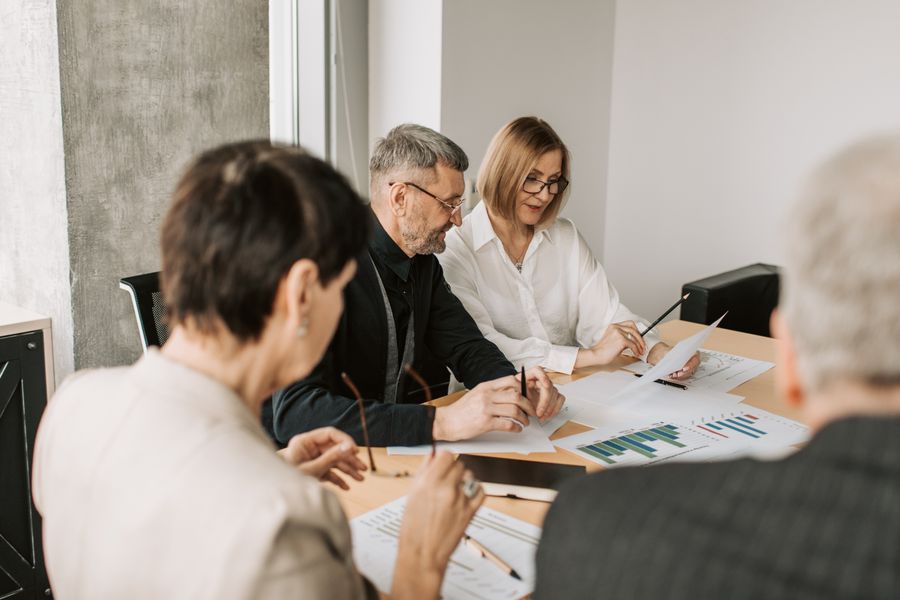 Elderly man and woman looking at documents — stock photo for Apply a Brand Kit
