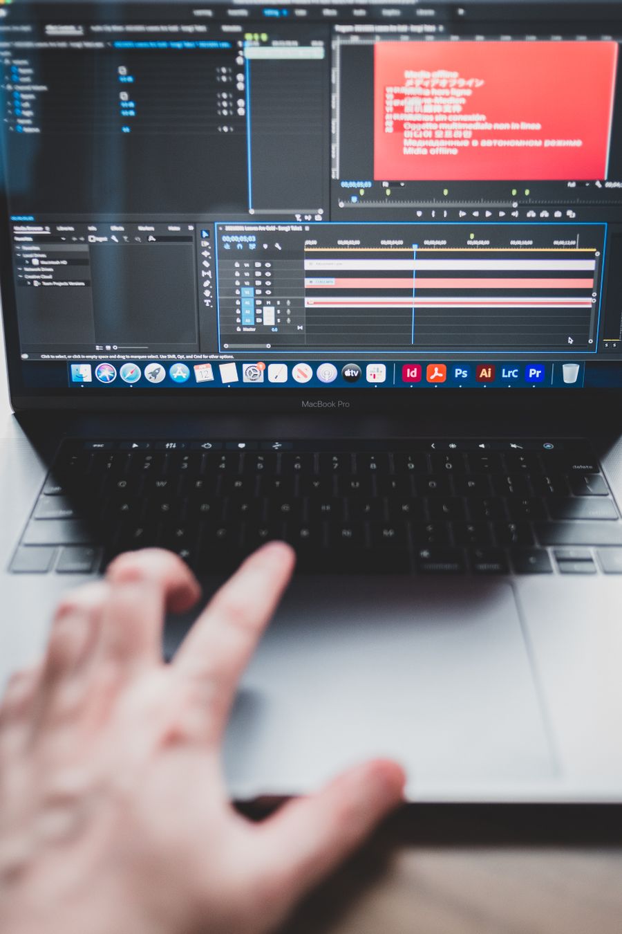 Crop man using laptop while making music — stock photo for Video templates