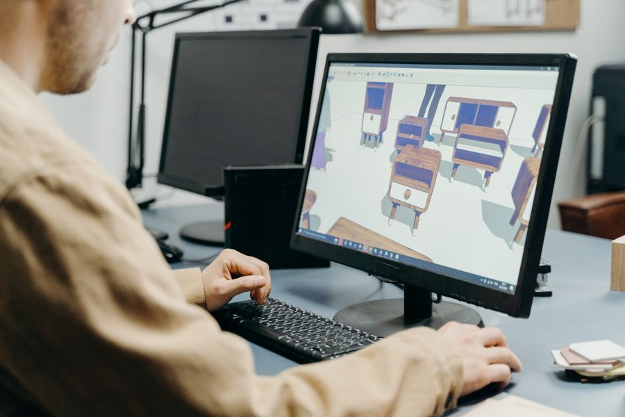 A man using a computer in designing — stock photo for Create a Design