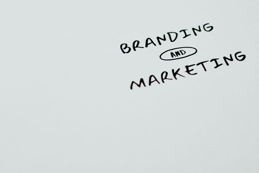 Branding and marketing text on a white surface — Start designing free