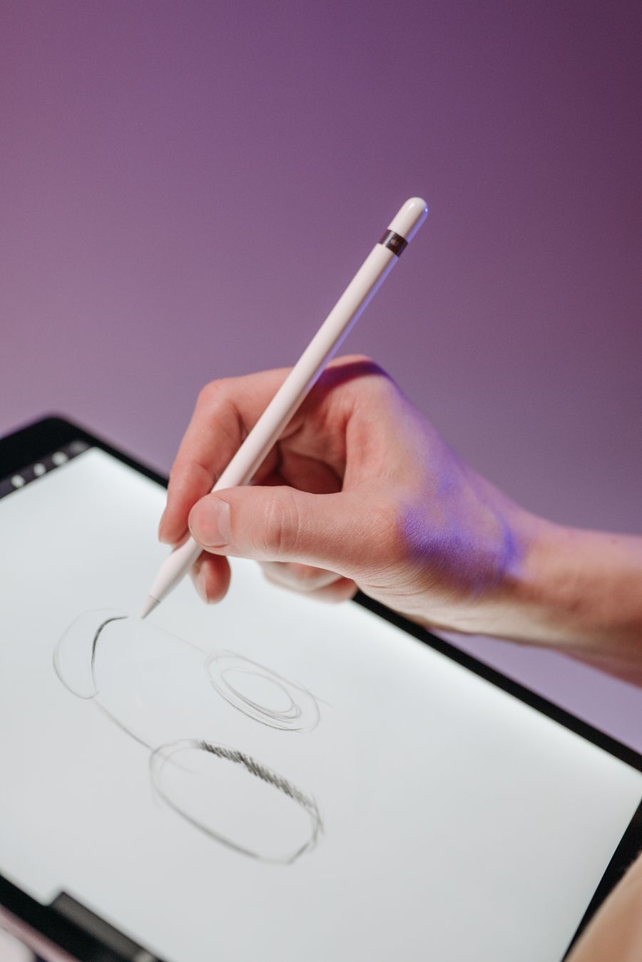 A person drawing on a tablet — Browse Design Templates browser mockup