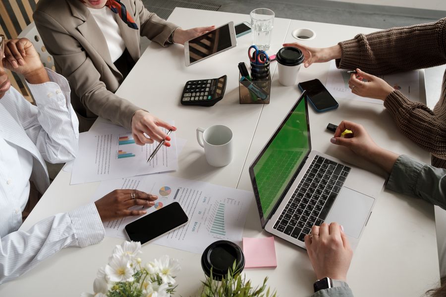 People hands on table at work — Advertisements in use