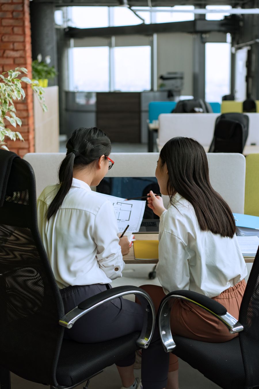 Two women in white dress shirt working together — Advertisements templates layers-panel mockup